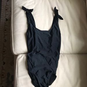 Simple black one piece bathing suit